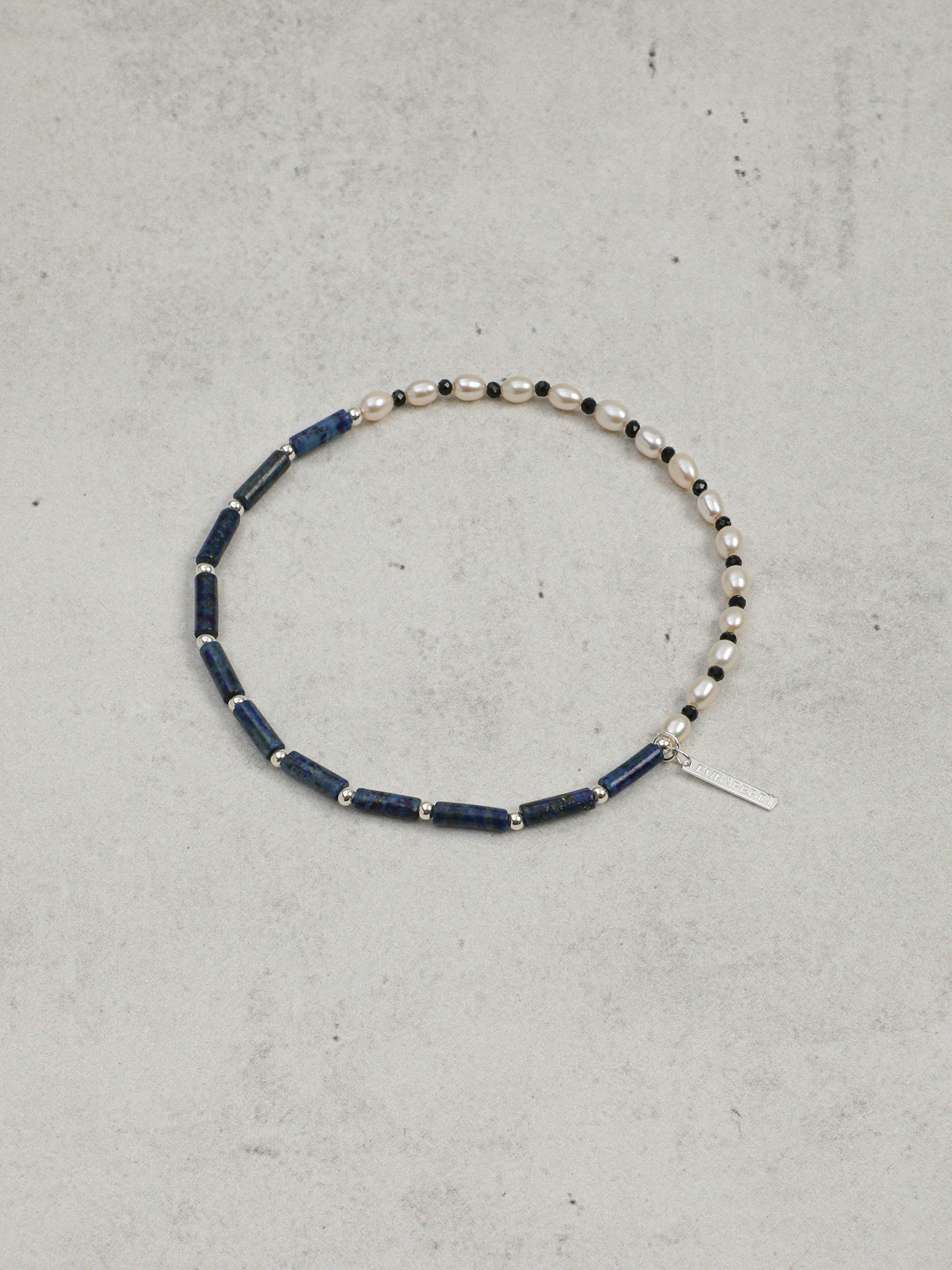 The Aegean Lapis and Oval Rice Pearl Double Strand