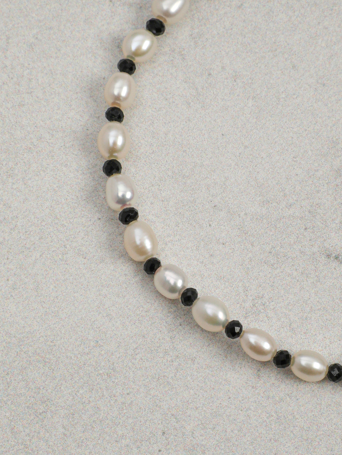 The Aegean Lapis and Oval Rice Pearl Double Strand