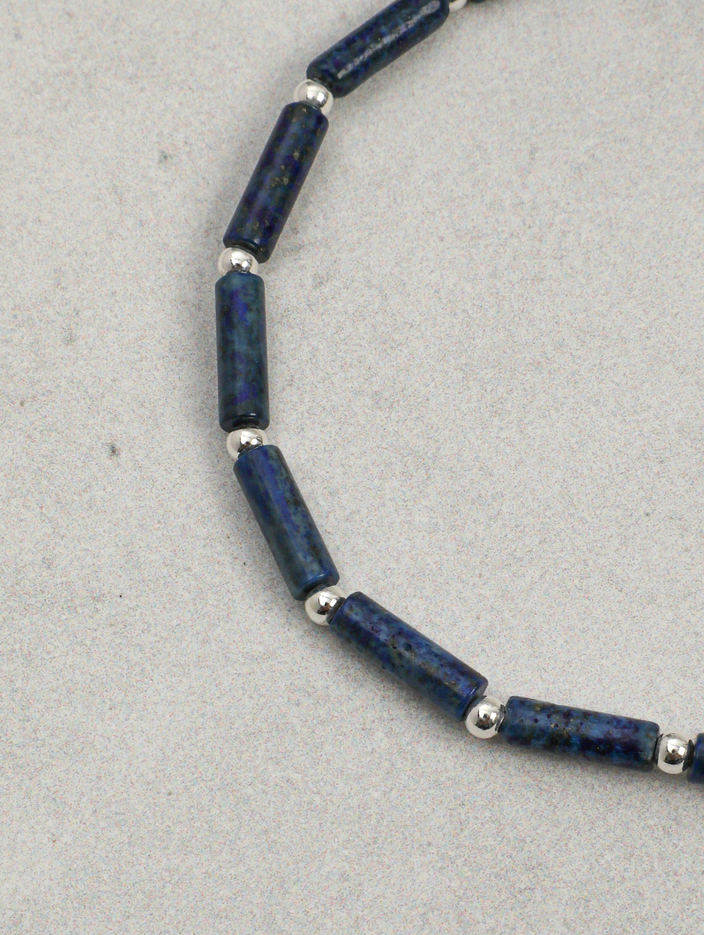 The Aegean Lapis and Oval Rice Pearl Double Strand