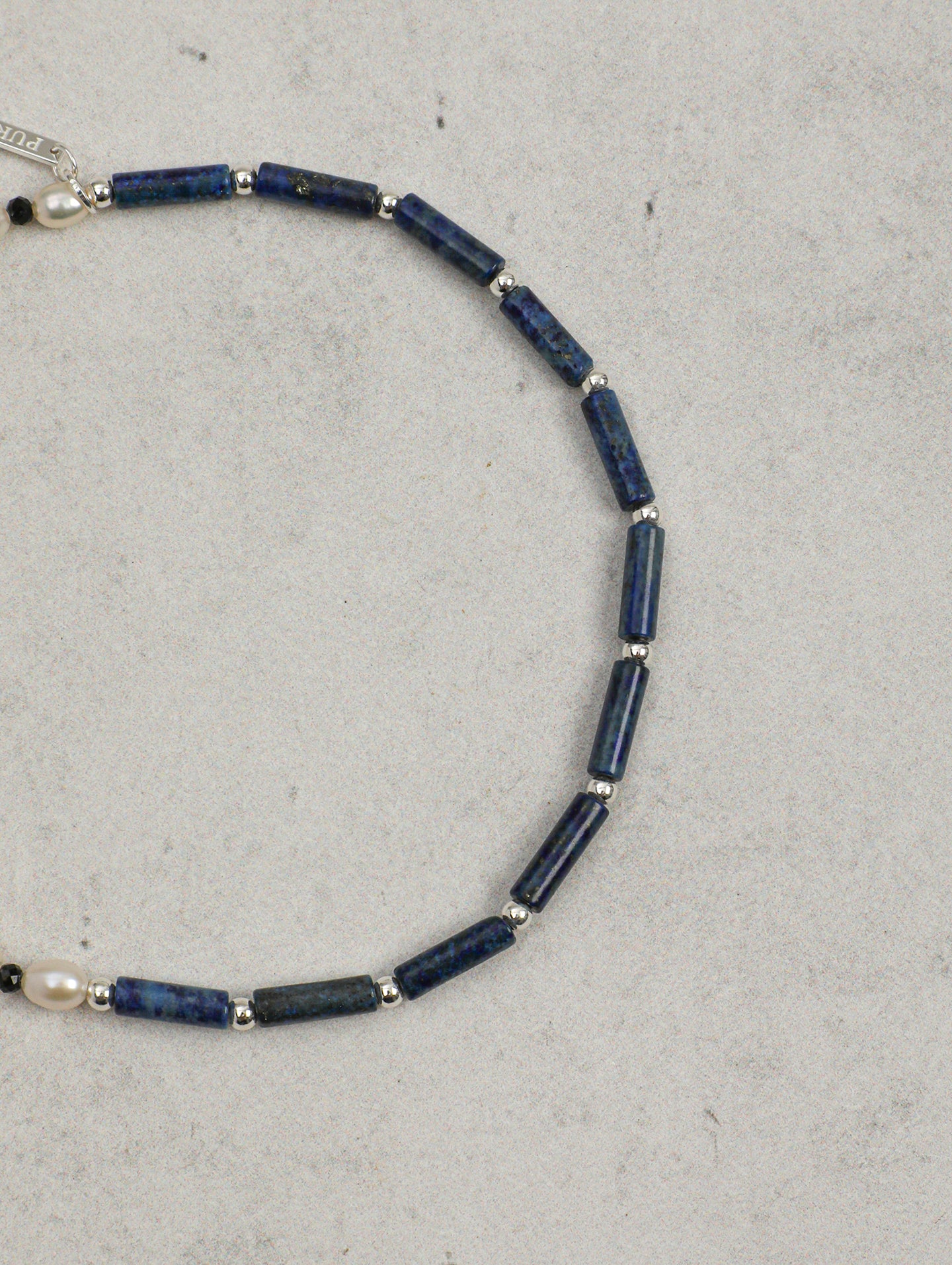 The Aegean Lapis and Oval Rice Pearl Double Strand