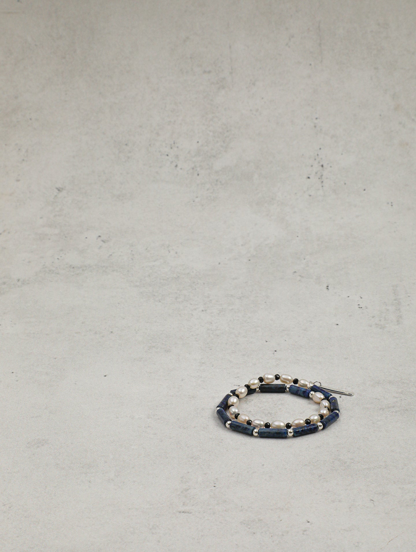The Aegean Lapis and Oval Rice Pearl Double Strand